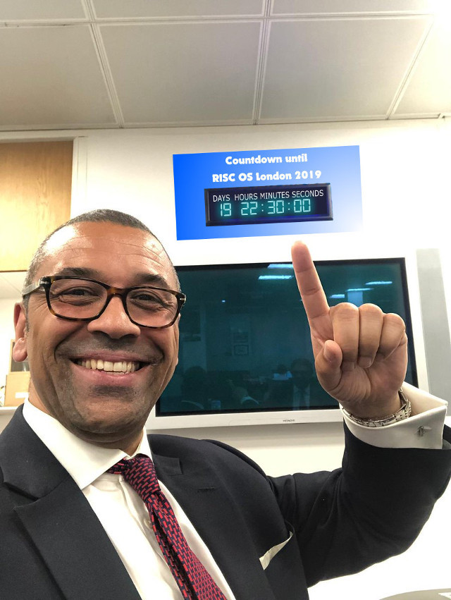 The ironically named James Cleverley helpfully pointing to the clock that counts down until the 2019 RISC OS London Show