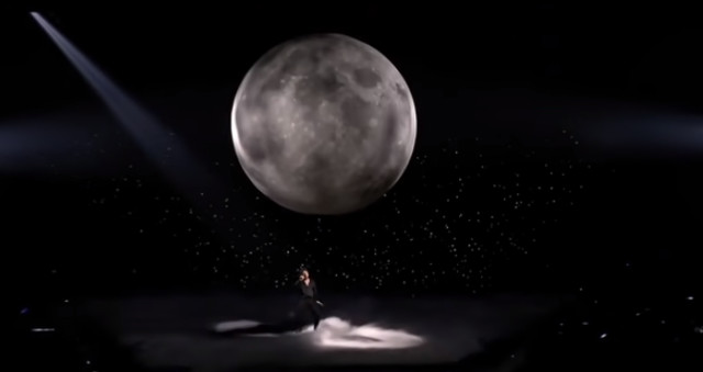 A very small, dangerously close moon at Eurovision 2021