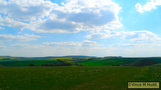 A view from the top of Wadon Hill. The top of Silbury Hill is clearly visible on the right, and about a third of the way up on the extreme left, the thin dark line is West Kennet Long Barrow.