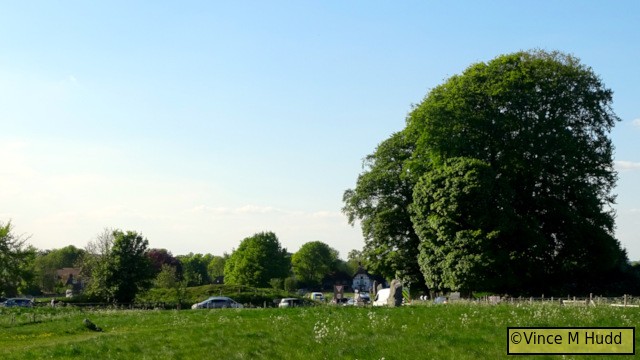 The end of the avenue, with Avebury itself ahead.